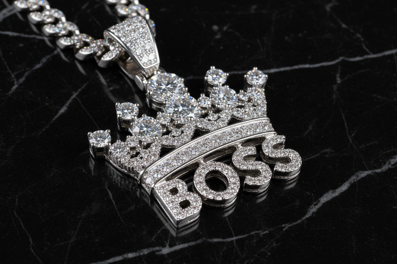 Diamond BOSS with a crown pendant with black marble background